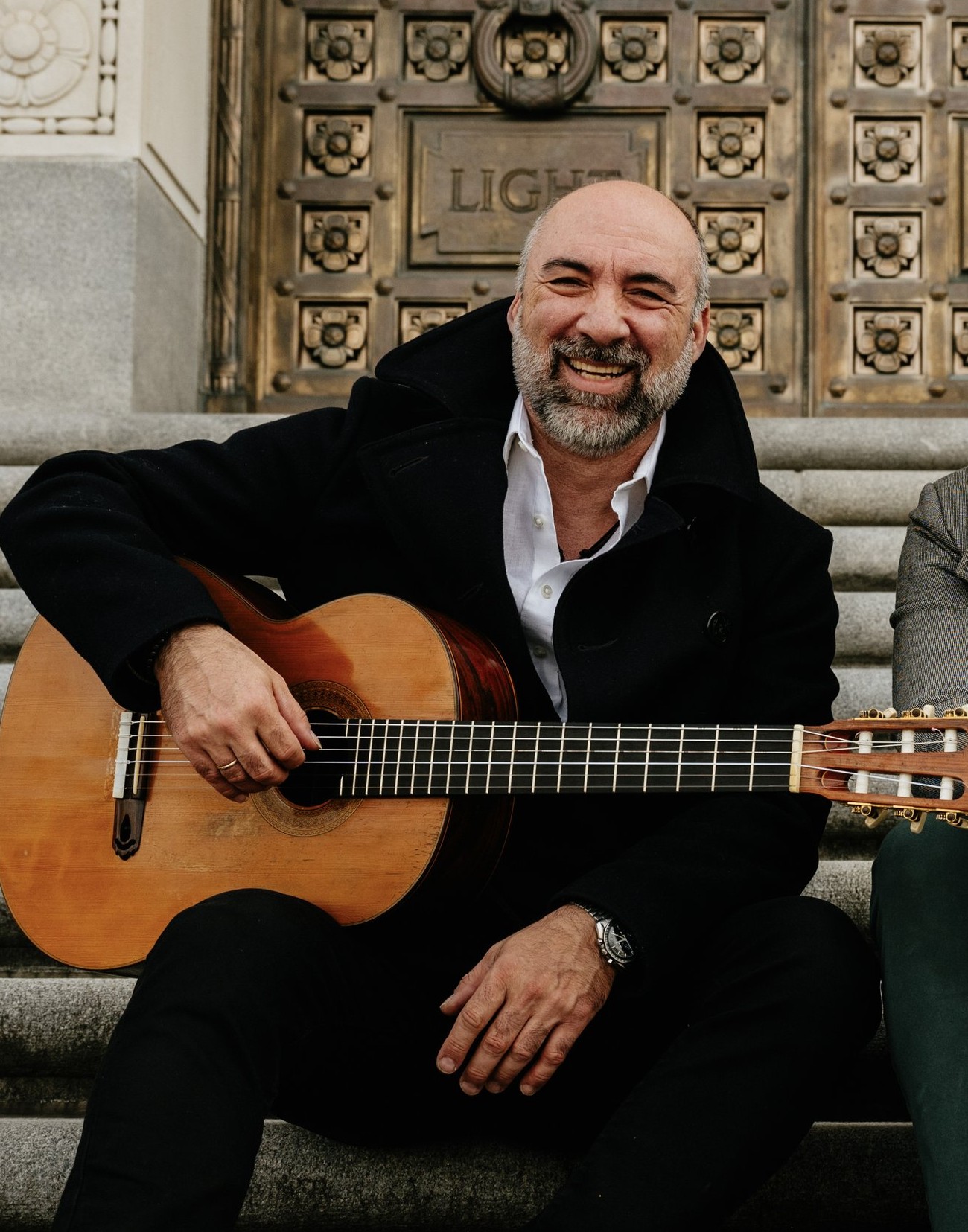 Petar Jankovic — smiling portrait with classical guitar